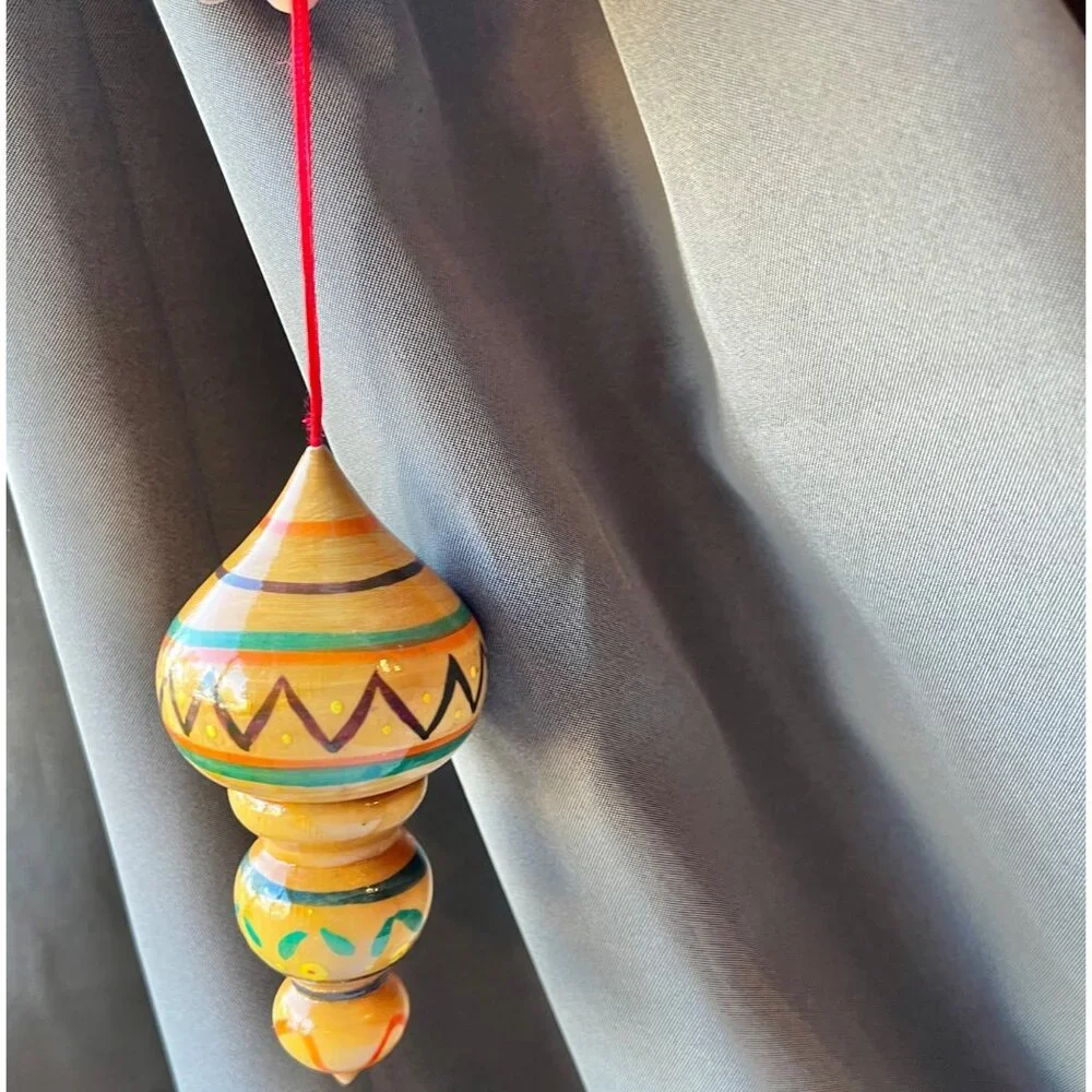 Handcrafted Wooden Hanging Ornament With Vibrant Tribal Patterns